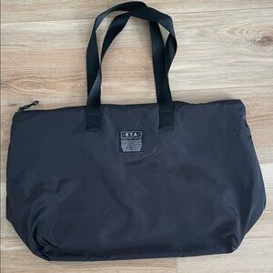 ETA Black Women's Soft Travel Tote with Trolley Sleeve & Accessories Bag